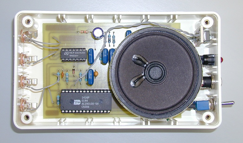 The PCB, speaker, connectors and switches inside the box