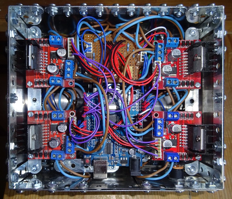 The underside of the Meccano box showing the physical layout and wiring of the electronics